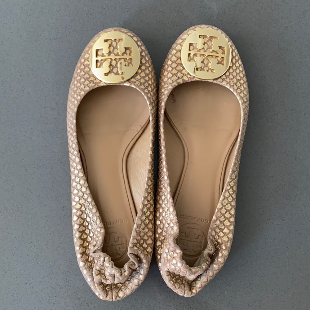 Gold Tory Burch flats.